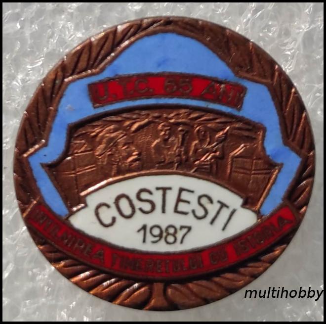 Insigna - 65 Ani UTC<br/> COSTESTI 1987<br/> Intalnira Tineretului Cu Istoria