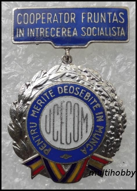 Insigna - Cooperator Fruntas In Intrecerea Socialista - Pentru Merite Deosebite In Munca - UCECOM
