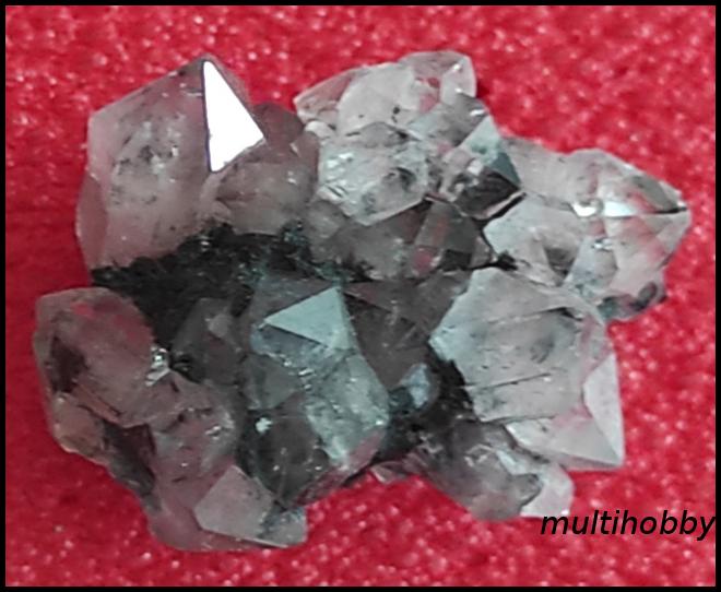 Mineral - Diamant de Maramures biterminal
cu incluziuni de
Bulangerit